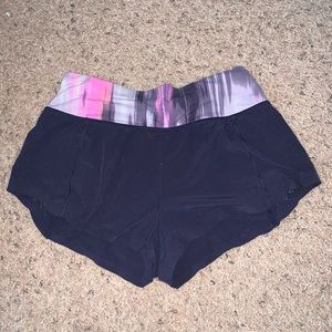 size 2 lululemon shorts navy blue with cool band